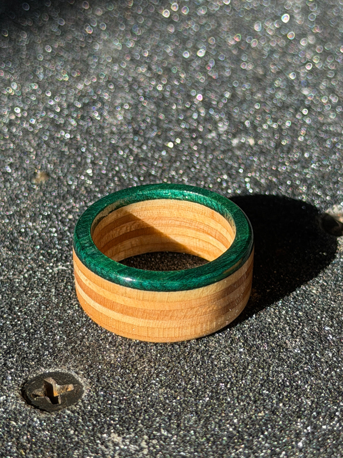 Dark Blue & Green recycled skateboard ring with sealed maple plies – wood ring care guide — Bayshore Rings handmade skateboard jewelry, Tampa FL